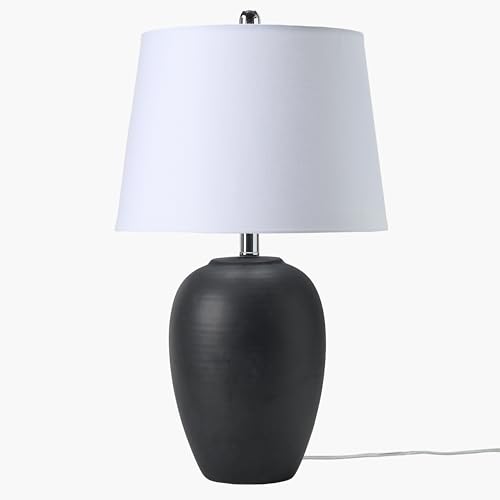 23-inch black distressed ceramic table lamp with tapered white drum shade
