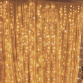 300-LED curtain string light with 8 modes, plug-in, warm white