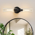 Matte black hardwired wall sconces with clear glass for decor