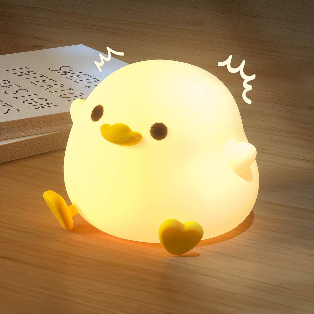 Squishy duck-shaped silicone night light with touch sensor and dimming