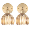 Adjustable brass wall sconce set with amber glass for home decor