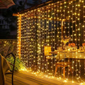300-LED warm white curtain string light for windows, weddings and indoor decor
